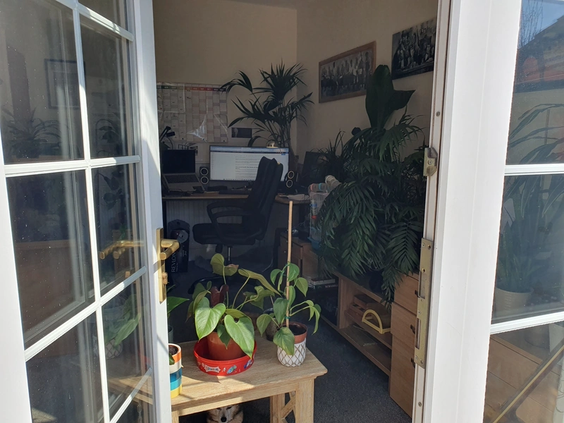 Tony Cooper in his Telford office with plants